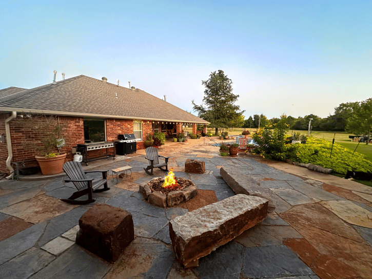 Transform Your Backyard This Fall with Flagstone Pathways, Fire Pits, and Outdoor Retreats